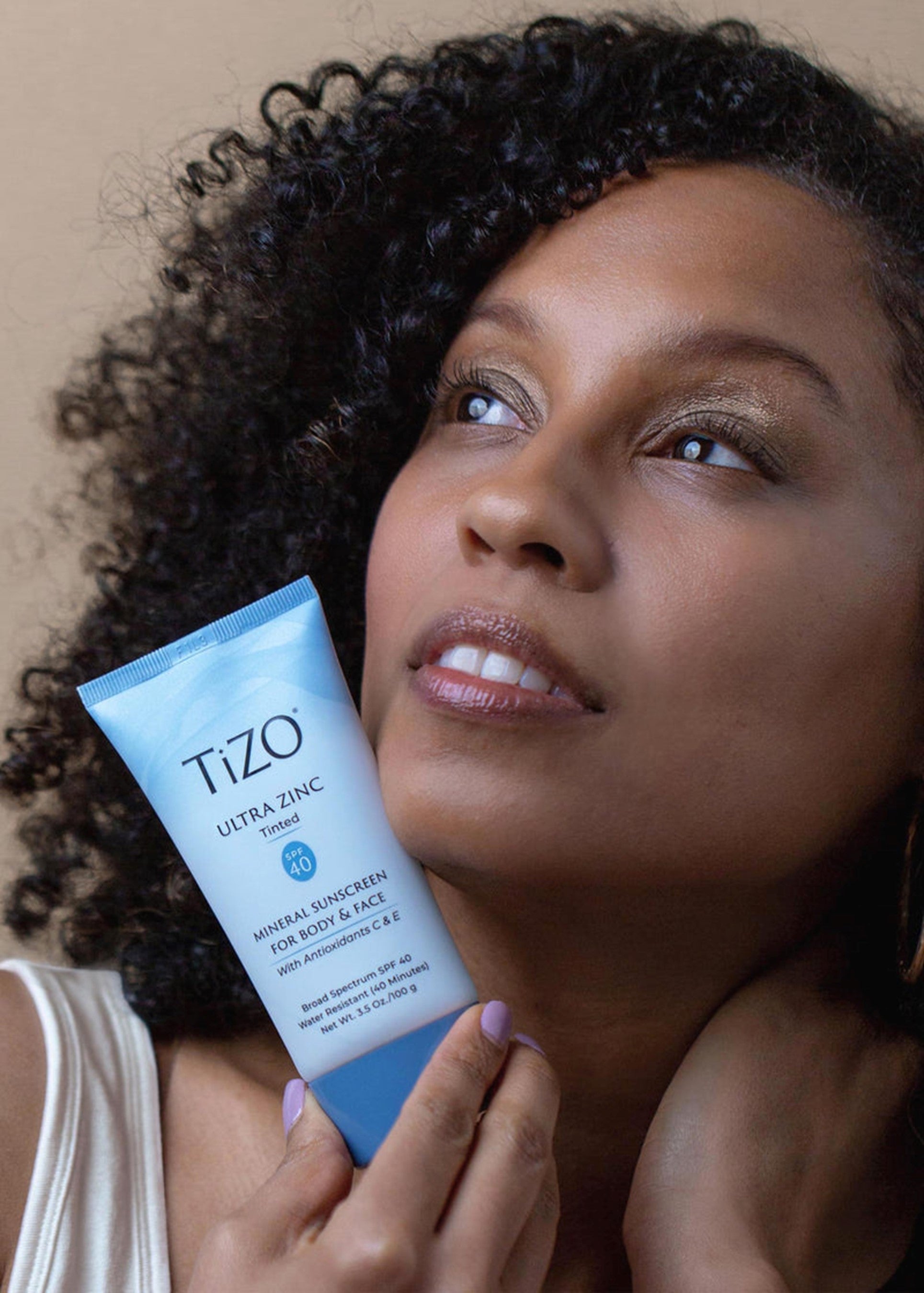 Ultra Zinc Body & Face Tinted SPF 40 with model